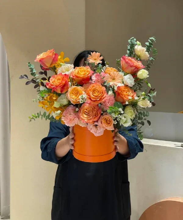 giỏ hoa hồng cam cháy