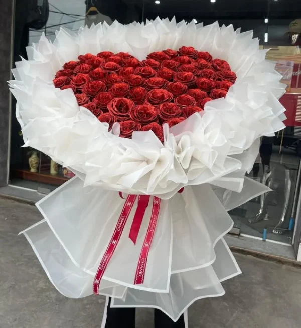Bó hoa sáp đỏ gói giấy trắng tặng 14/2 Bó hoa sáp đỏ gói giấy trắng tặng 14/2
