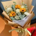 bó hoa hướng dương giấy báo