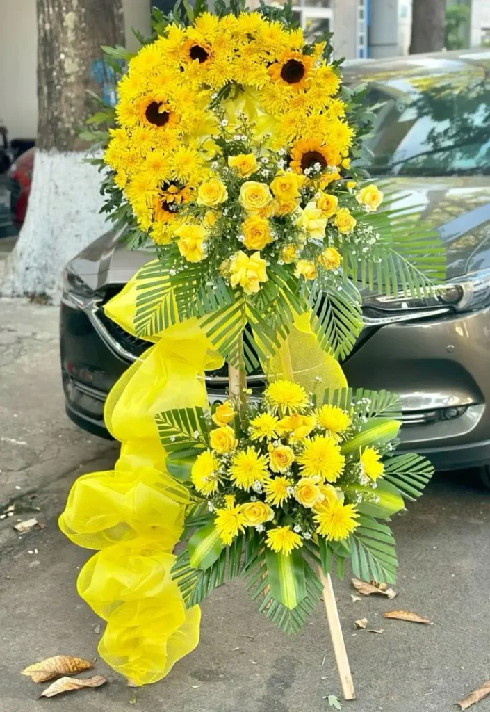 hoa chia buồn tone vàng